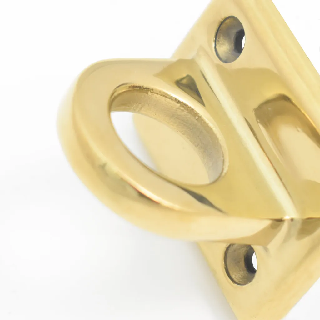 Fixation murale dorée pour cordon de délimitation – détail de la platine avec trous de vis pour fixation murale TELNALINE